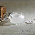 wholesales High-grade golden carved ABS cap transparent glass cosmetic bottles/jars with good price